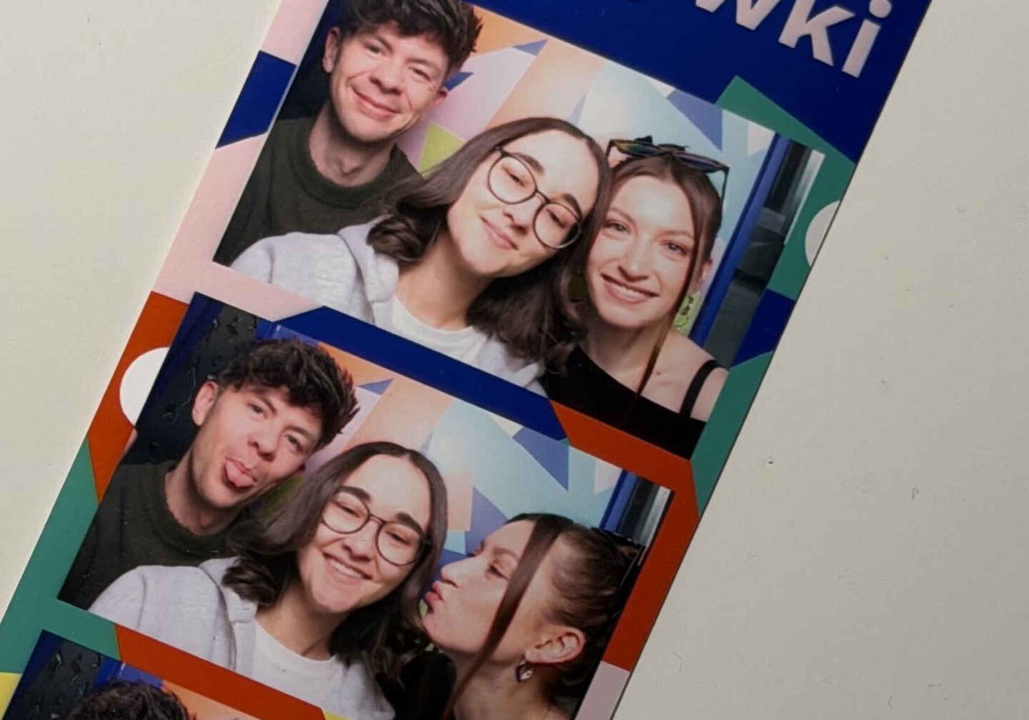 Brandbeet team members in a photobooth