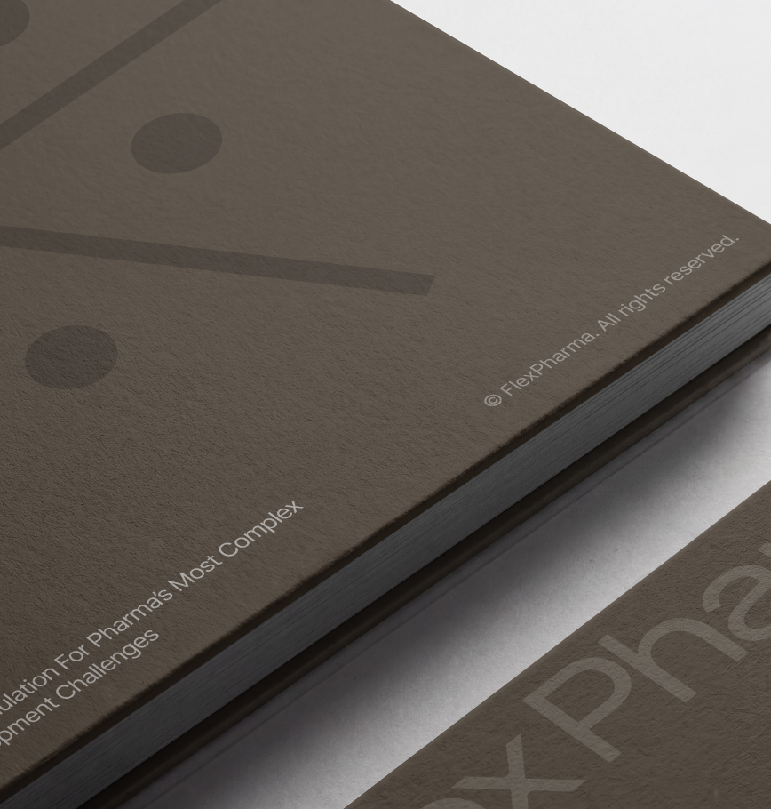 Flex Pharma brand book with embossed typography on a textured taupe cover
