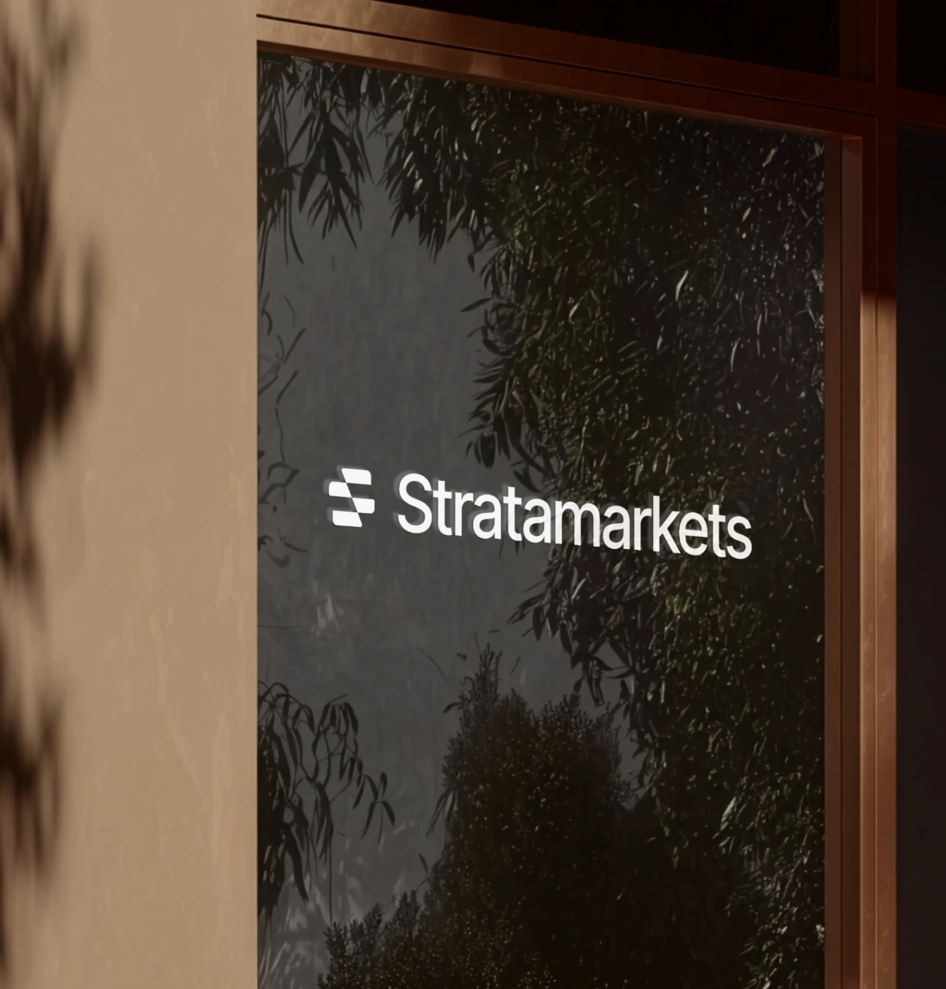 Stratamarkets logo on glass entrance signage